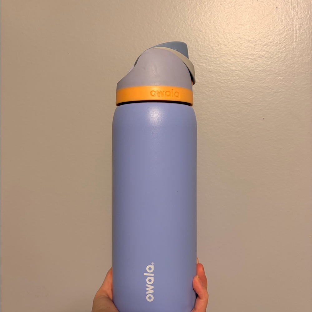 Owala light periwinkle and orange Insulated Water Bottle